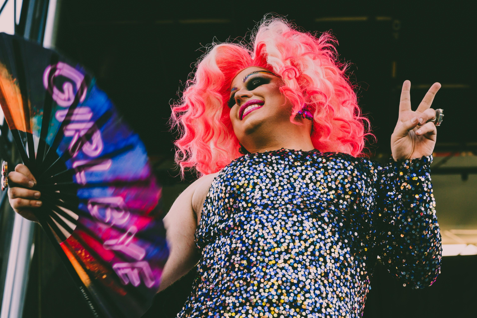 A drag performer celebrating at Pride