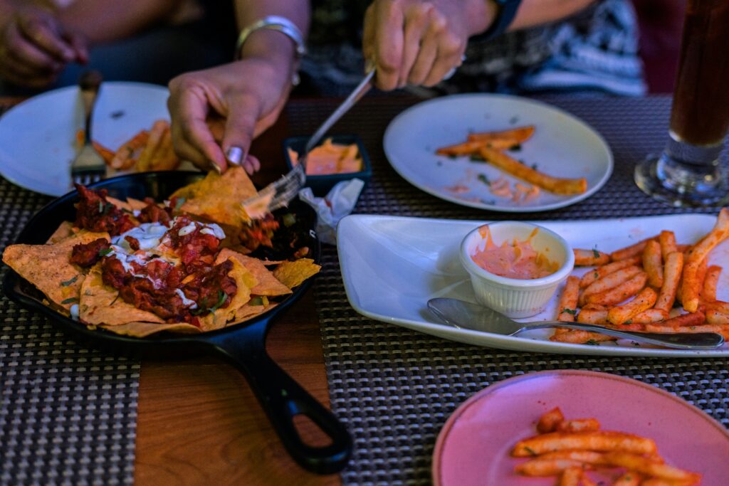 Friends sharing a meal at a community supper club