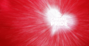 Capital Pride London logo on red Valentine's Day themed background with light rays